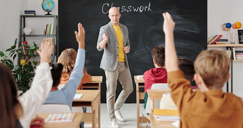 Teacher in front of students