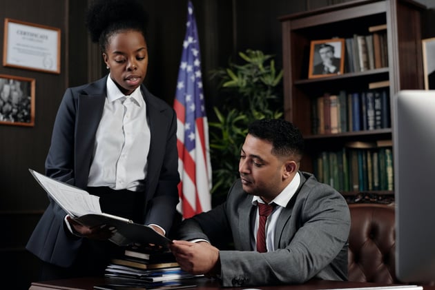 Lawyers Looking at Documents
