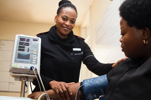 Nurse practitioner with patient
