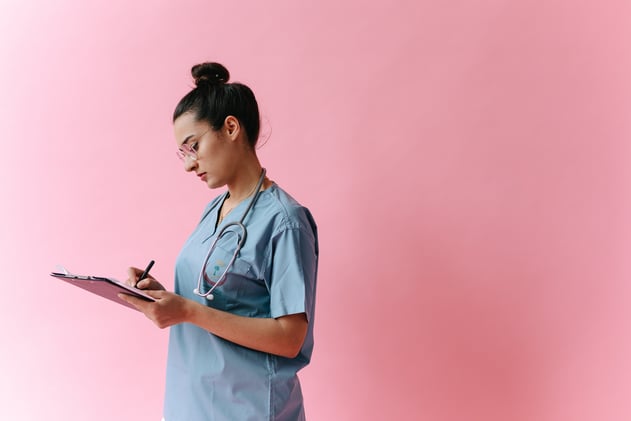 A Doctor Taking Notes
