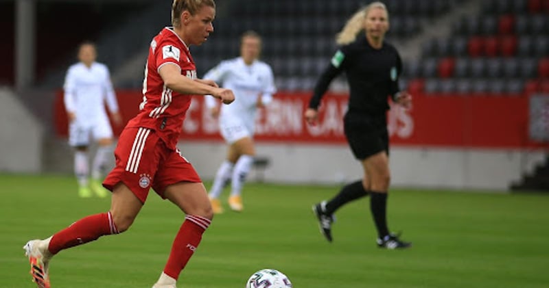 Women playing soccer