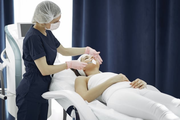 Woman Getting a Facial Treatment
