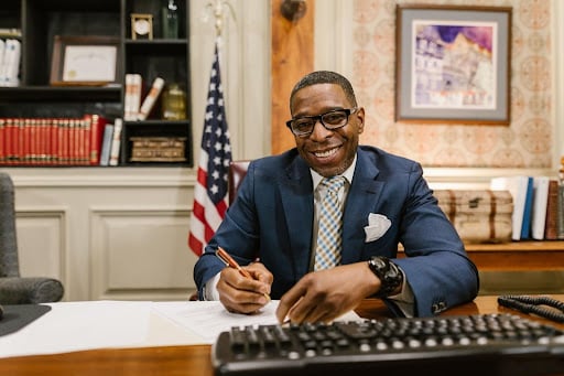 Man signing papers